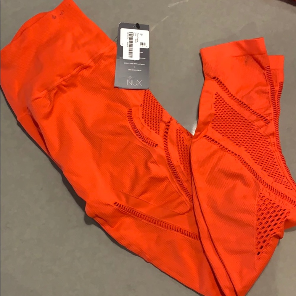 Nux legging. Small marking on waist band see pic. Price reflected